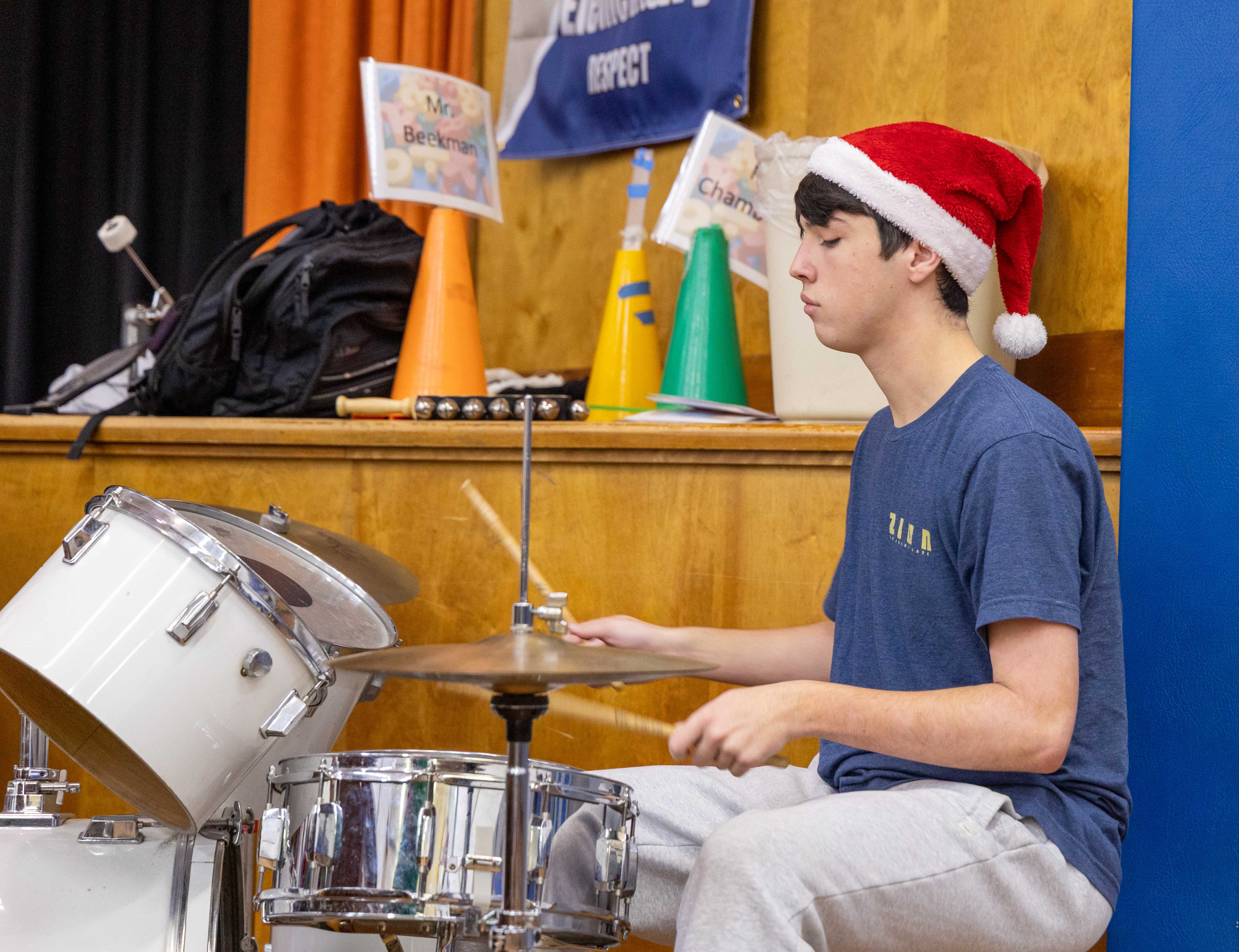 A HS student plays the drums at Radez